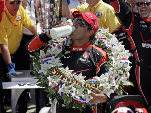 Juan Pablo Montoya, of Colombia, celebrates after winning the 99th running of the Indianapolis 500 auto race at Indianapolis Motor Speedway in Indianapolis, Sunday, May 24, 2015.  (AP Photo/Darron Cummings)