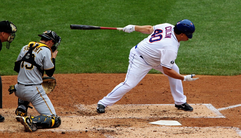 May 28, 2014; New York, NY, USA; New York Mets starting pitcher Bartolo Colon (40) swings and misses in the second inning against the Pittsburgh Pirates at Citi Field. Mandatory Credit: Noah K. Murray-USA TODAY Sports