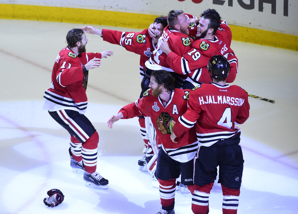 Jun 15, 2015; Chicago, IL, USA; The Chicago Blackhawks celebrate after defeating the Tampa Bay Lightning 2-1in game six of the 2015 Stanley Cup Final against the Tampa Bay Lightning at United Center. Mandatory Credit: David Banks-USA TODAY Sports ORG XMIT: USATSI-225748 ORIG FILE ID:  20150615_cja_bb6_052.JPG