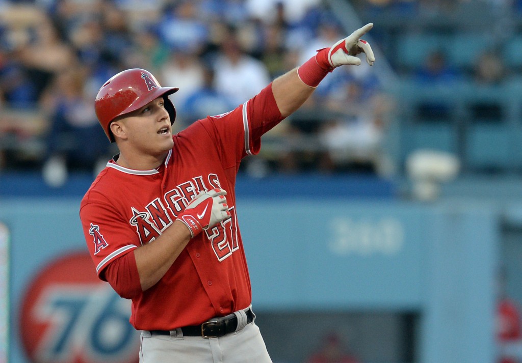 Aug 4, 2014; Los Angeles, CA, USA;   Los Angeles Angels center fielder Mike Trout (27) reacts on second base after he doubled in a run in the first inning of the game Los Angeles Dodgers at Dodger Stadium. Mandatory Credit: Jayne Kamin-Oncea-USA TODAY Sports