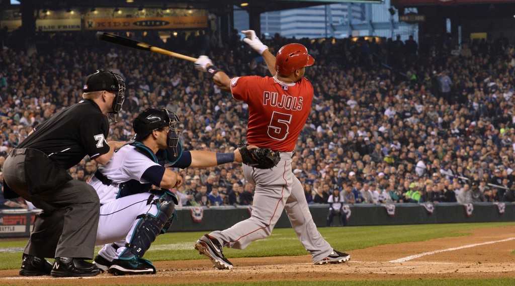 The Los Angeles Albert Pujols hits a two-run home run in the first inning against the Seattle Mariners at Safeco Field in Seattle on Tuesday, April 8, 2014. (Drew Perine/Tacoma News Tribune/MCT)
