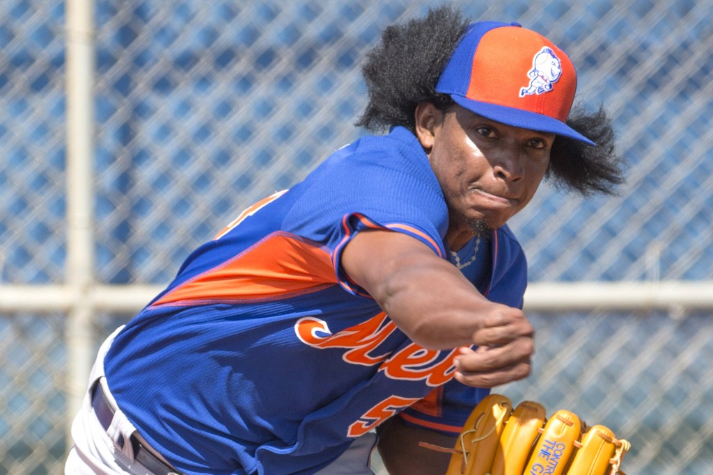 Port St Lucie, FL - February 23rd: New York Mets Spring Training, Port St Lucie Fl. During a pitchers and catchers workout, position players voluntarily join the team during the workout. New York Mets relief pitcher Jenrry Mejia #58 throws during the workout. February 23rd, 2015. (Photo by Anthony J. Causi)