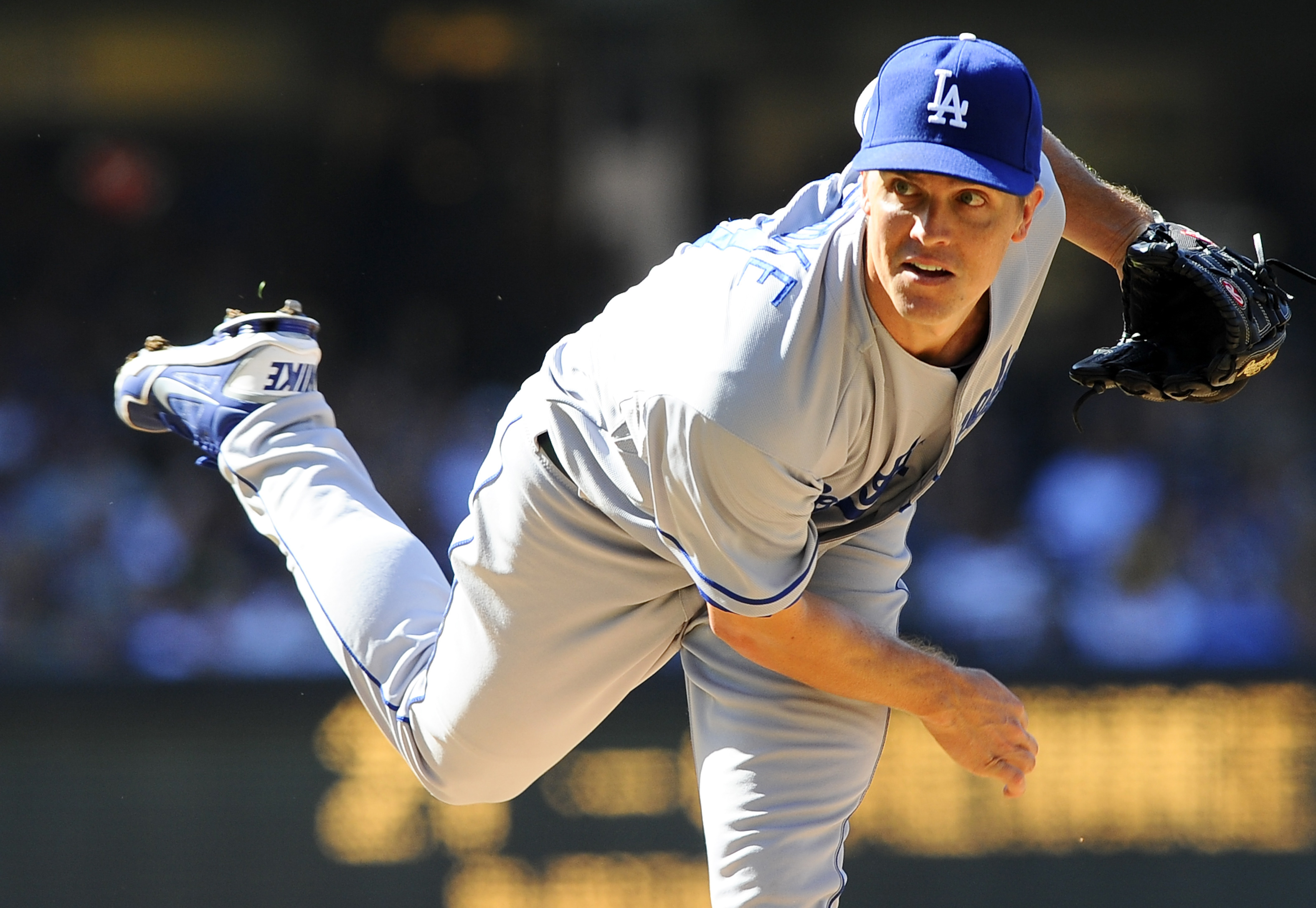 June 22, 2013; San Diego, CA, USA; Los Angeles Dodgers starting pitcher Zack Greinke (21) throws during the first inning against the San Diego Padres at Petco Park. Mandatory Credit: Christopher Hanewinckel-USA TODAY Sports