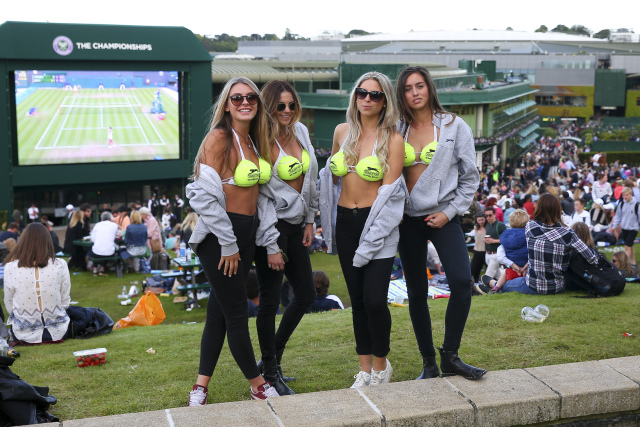 LONDON, ENGLAND - JULY 02: Spectators in Slazenger bikinis look on from Murray Mound during day six of the Wimbledon Lawn Tennis Championships at the All England Lawn Tennis and Croquet Club on July 2, 2016 in London, England. (Photo by Getty Images/Getty Images)