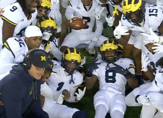 Michigan gets a pick-six the second play of the game Jim Harbaugh joins the celebration.