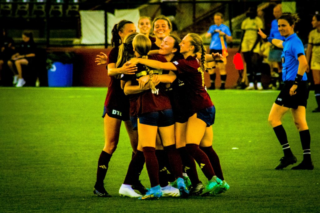 Detroit City FC celebrates a goal over River Light FC.