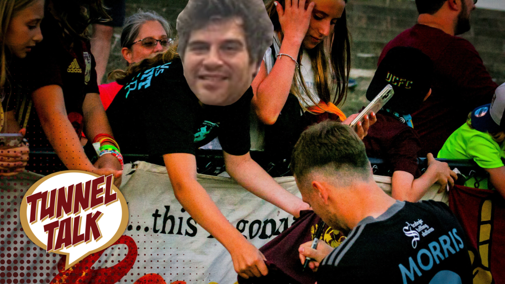 Jaime getting autographs after a Detroit City FC match.