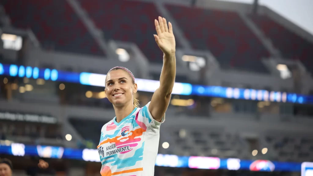 Alex Morgan waving goodbye. 