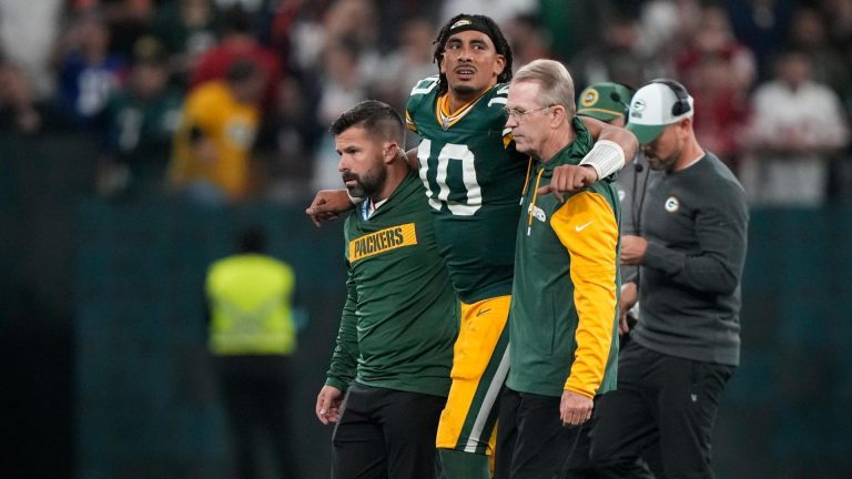 Jordan Love injured with the Packers.