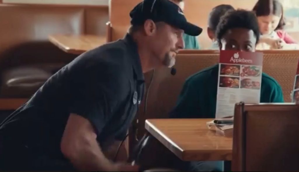 Lions head coach Dan Campbell in an Applebees commerical. 