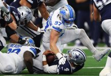 Lions: Aidan Hutchinson suffers what looks to be a serious leg injury