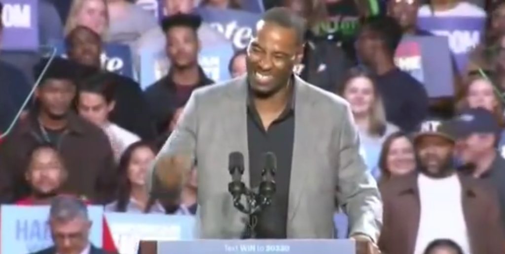 Lions legend Calvin Johnson at a Detroit rally for Kamala Harris. 