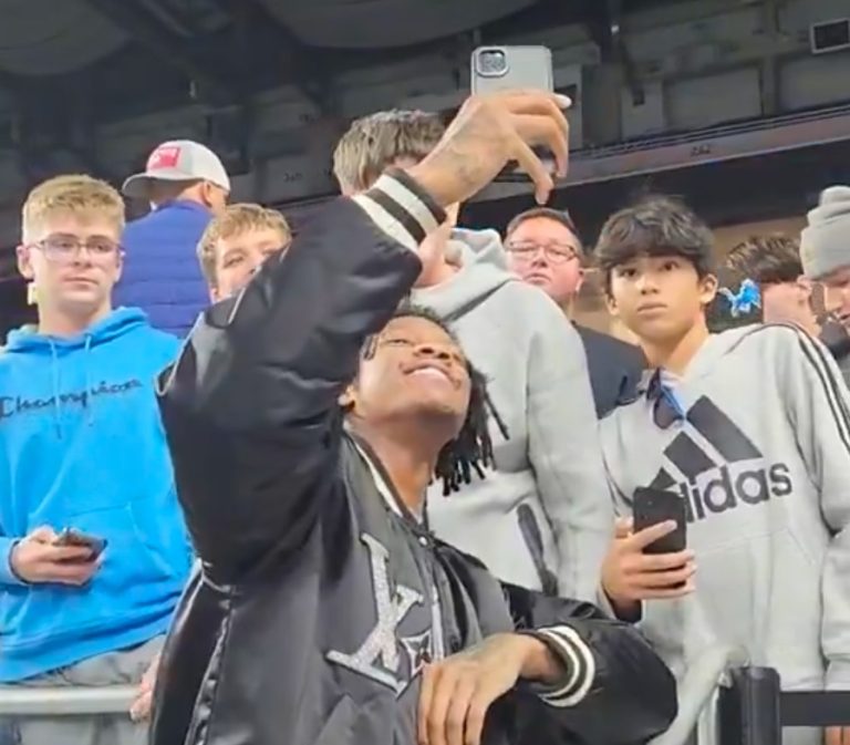 WATCH: Jameson Williams takes pictures with fans at the MHSAA Finals