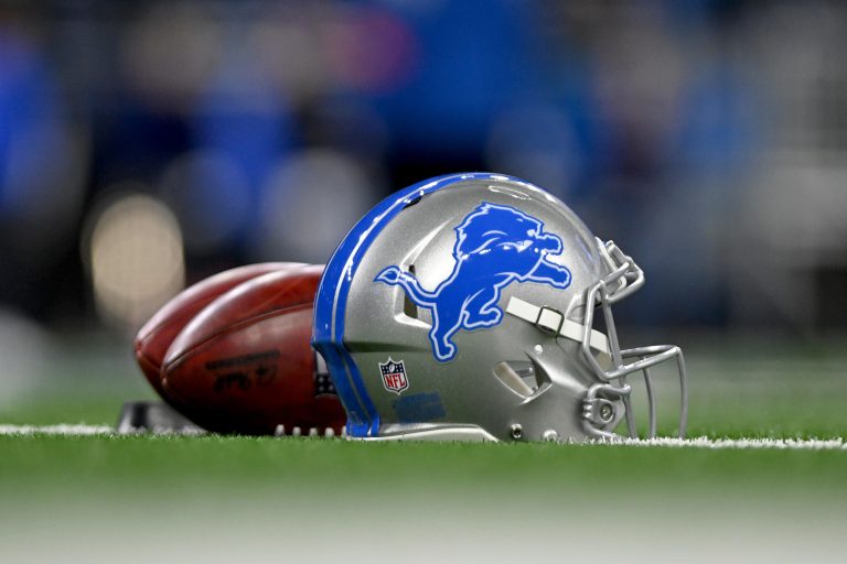 Detroit Lions helmet and football.